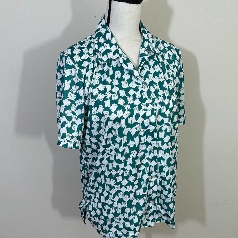 Vicki. Wayne’s sz 10 silky feel blouse. White with a small green print